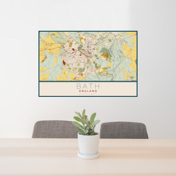 24x36 Bath England Map Print Lanscape Orientation in Woodblock Style Behind 2 Chairs Table and Potted Plant