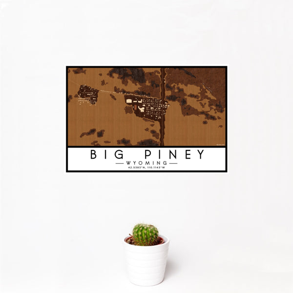 12x18 Big Piney Wyoming Map Print Landscape Orientation in Ember Style With Small Cactus Plant in White Planter