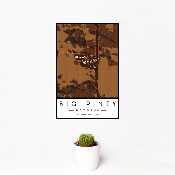 12x18 Big Piney Wyoming Map Print Portrait Orientation in Ember Style With Small Cactus Plant in White Planter