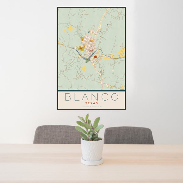 24x36 Blanco Texas Map Print Portrait Orientation in Woodblock Style Behind 2 Chairs Table and Potted Plant