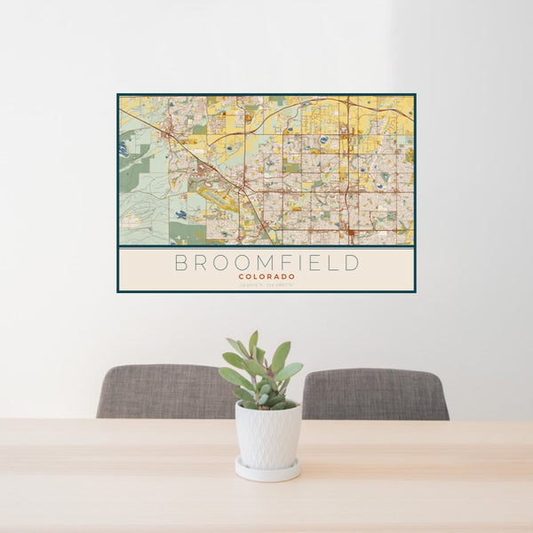 24x36 Broomfield Colorado Map Print Landscape Orientation in Woodblock Style Behind 2 Chairs Table and Potted Plant