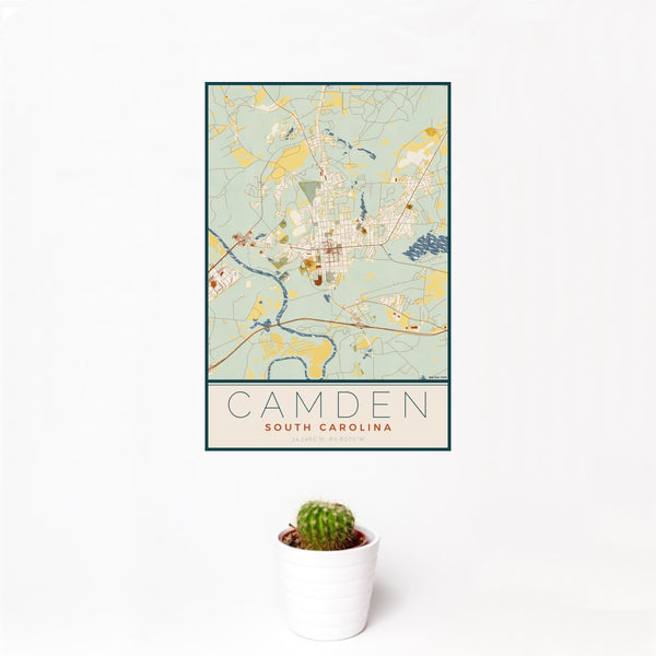 12x18 Camden South Carolina Map Print Portrait Orientation in Woodblock Style With Small Cactus Plant in White Planter