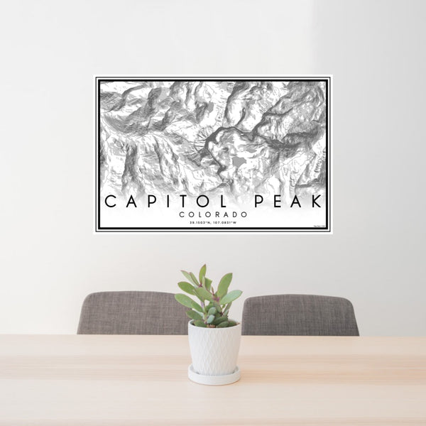 24x36 Capitol Peak Colorado Map Print Lanscape Orientation in Classic Style Behind 2 Chairs Table and Potted Plant