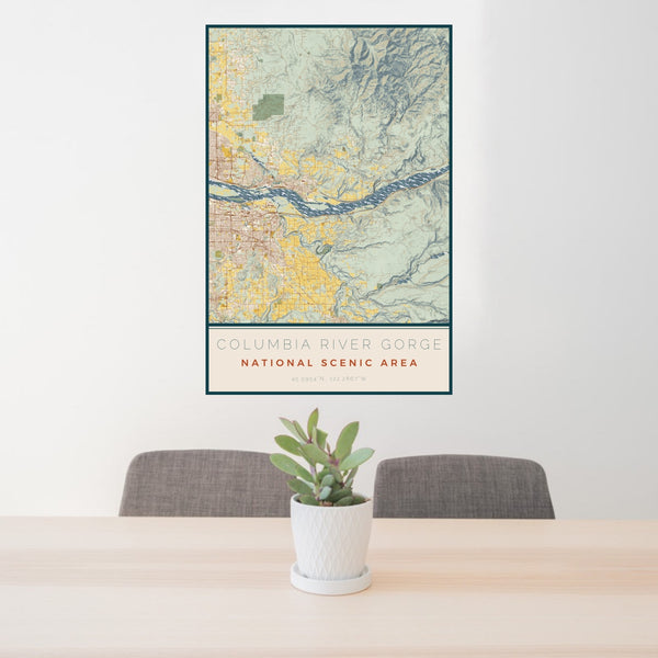 24x36 Columbia River Gorge National Scenic Area Map Print Portrait Orientation in Woodblock Style Behind 2 Chairs Table and Potted Plant