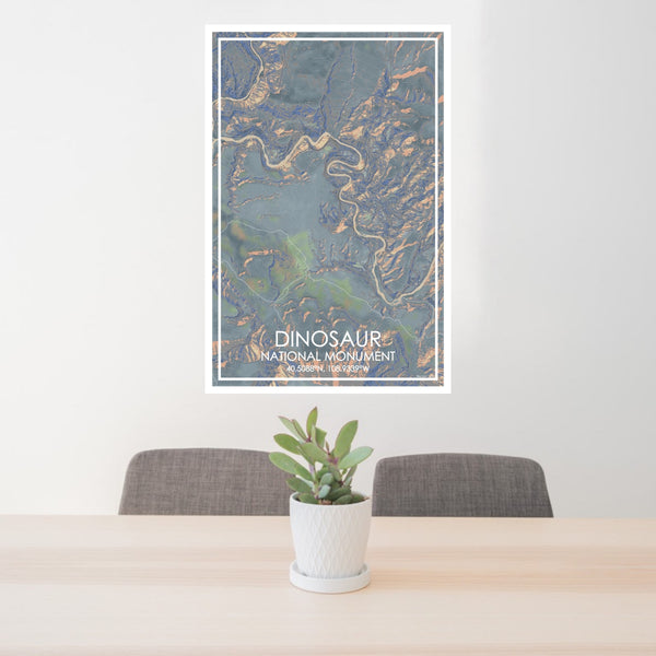 24x36 Dinosaur National Monument Map Print Portrait Orientation in Afternoon Style Behind 2 Chairs Table and Potted Plant
