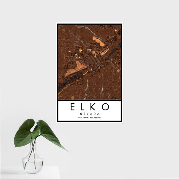 16x24 Elko Nevada Map Print Portrait Orientation in Ember Style With Tropical Plant Leaves in Water