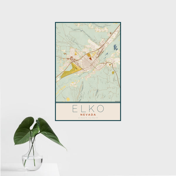 16x24 Elko Nevada Map Print Portrait Orientation in Woodblock Style With Tropical Plant Leaves in Water