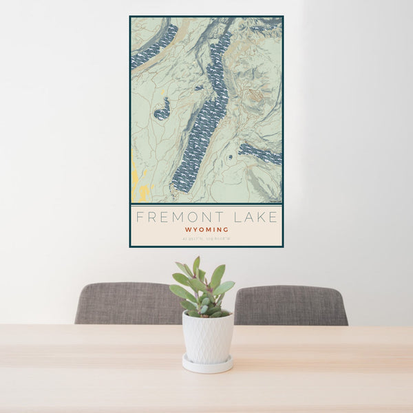 24x36 Fremont Lake Wyoming Map Print Portrait Orientation in Woodblock Style Behind 2 Chairs Table and Potted Plant