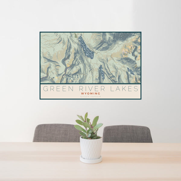 24x36 Green River Lakes Wyoming Map Print Lanscape Orientation in Woodblock Style Behind 2 Chairs Table and Potted Plant