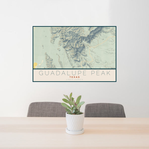24x36 Guadalupe Peak Texas Map Print Lanscape Orientation in Woodblock Style Behind 2 Chairs Table and Potted Plant