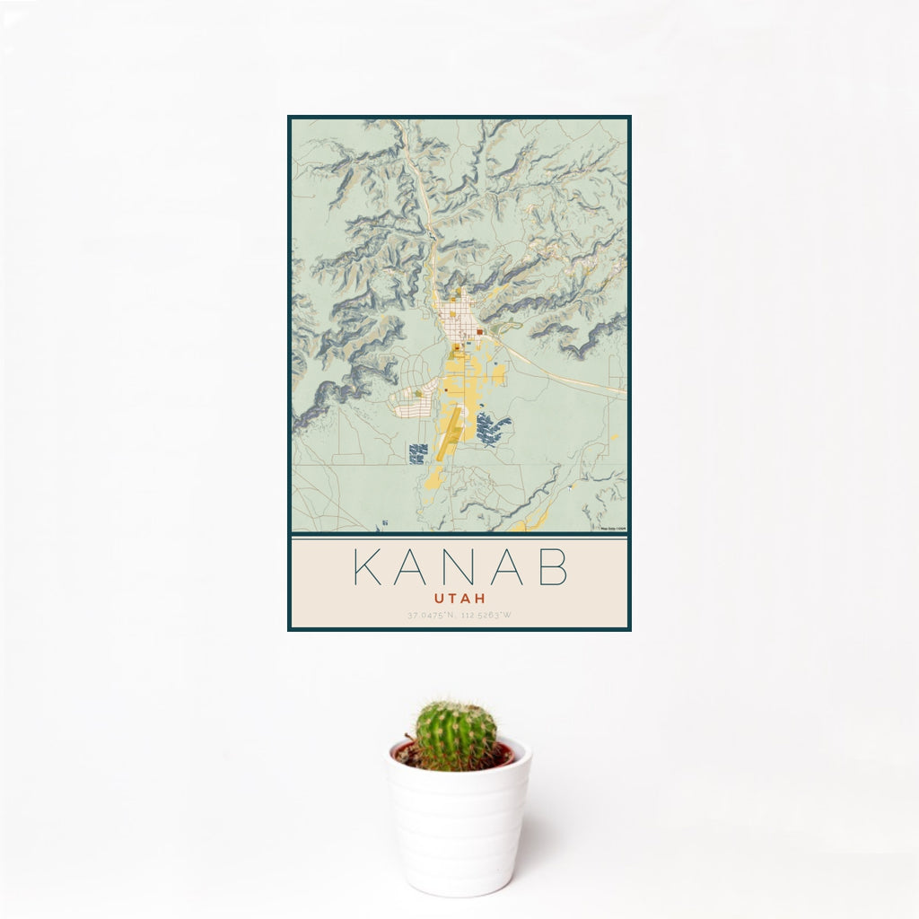 12x18 Kanab Utah Map Print Portrait Orientation in Woodblock Style With Small Cactus Plant in White Planter