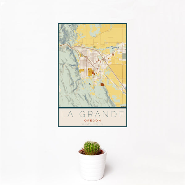12x18 La Grande Oregon Map Print Portrait Orientation in Woodblock Style With Small Cactus Plant in White Planter
