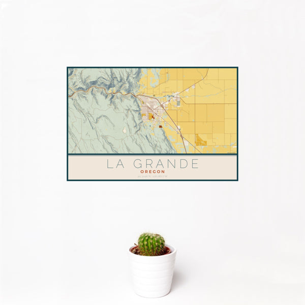 12x18 La Grande Oregon Map Print Landscape Orientation in Woodblock Style With Small Cactus Plant in White Planter