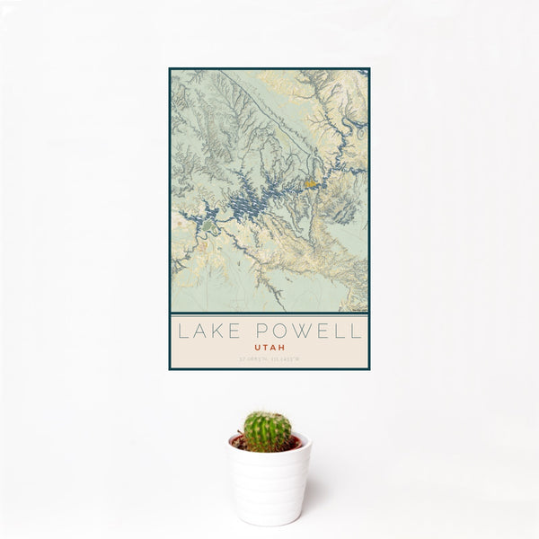 12x18 Lake Powell Utah Map Print Portrait Orientation in Woodblock Style With Small Cactus Plant in White Planter