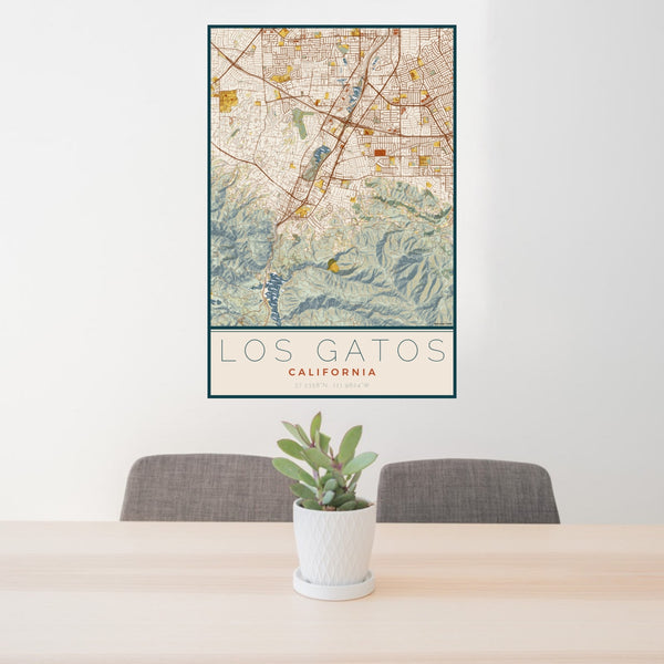 24x36 Los Gatos California Map Print Portrait Orientation in Woodblock Style Behind 2 Chairs Table and Potted Plant