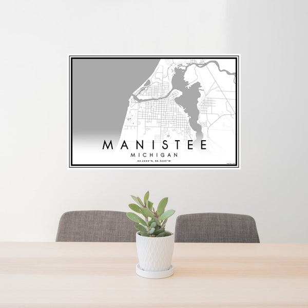 24x36 Manistee Michigan Map Print Lanscape Orientation in Classic Style Behind 2 Chairs Table and Potted Plant