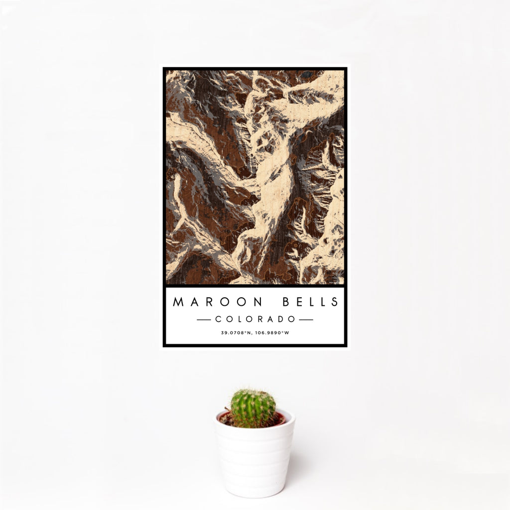 12x18 Maroon Bells Colorado Map Print Portrait Orientation in Ember Style With Small Cactus Plant in White Planter