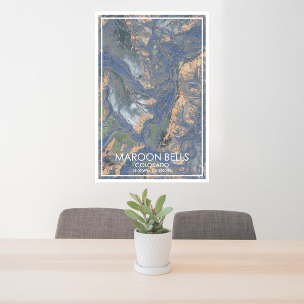 24x36 Maroon Bells Colorado Map Print Portrait Orientation in Afternoon Style Behind 2 Chairs Table and Potted Plant