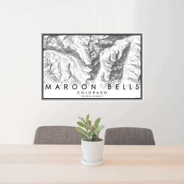 24x36 Maroon Bells Colorado Map Print Lanscape Orientation in Classic Style Behind 2 Chairs Table and Potted Plant