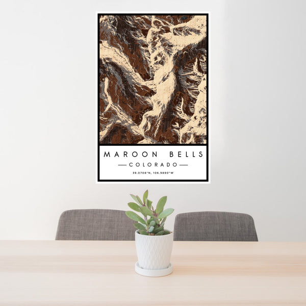24x36 Maroon Bells Colorado Map Print Portrait Orientation in Ember Style Behind 2 Chairs Table and Potted Plant