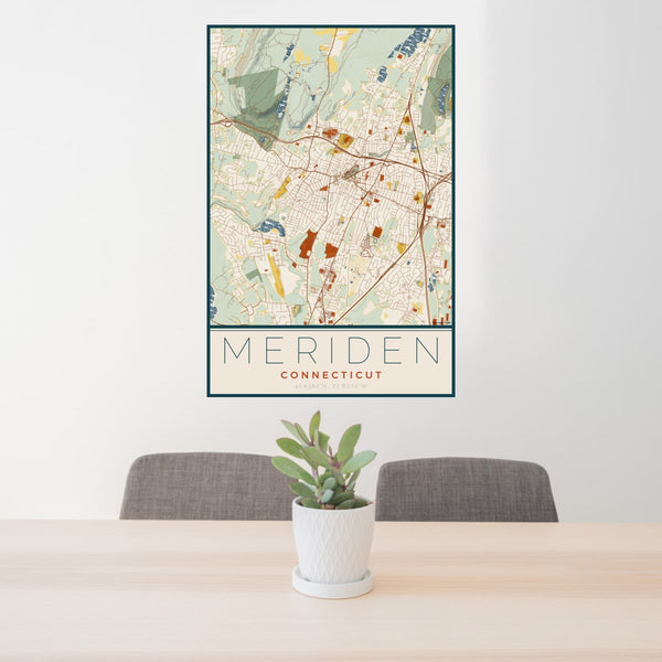 24x36 Meriden Connecticut Map Print Portrait Orientation in Woodblock Style Behind 2 Chairs Table and Potted Plant
