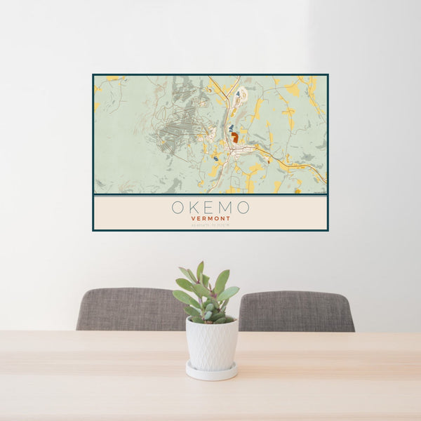 24x36 Okemo Vermont Map Print Landscape Orientation in Woodblock Style Behind 2 Chairs Table and Potted Plant