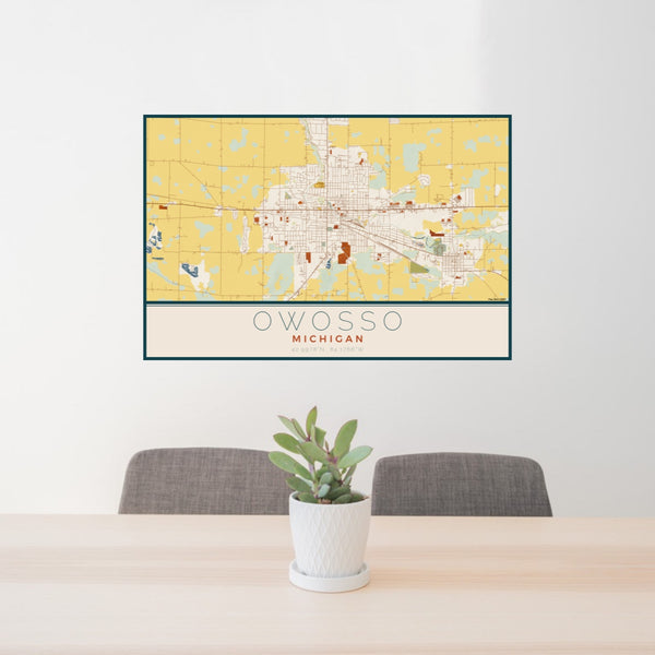 24x36 Owosso Michigan Map Print Lanscape Orientation in Woodblock Style Behind 2 Chairs Table and Potted Plant