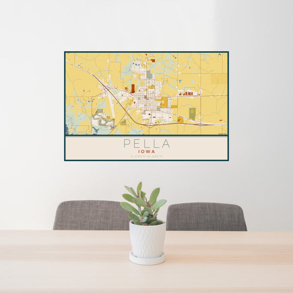 24x36 Pella Iowa Map Print Lanscape Orientation in Woodblock Style Behind 2 Chairs Table and Potted Plant