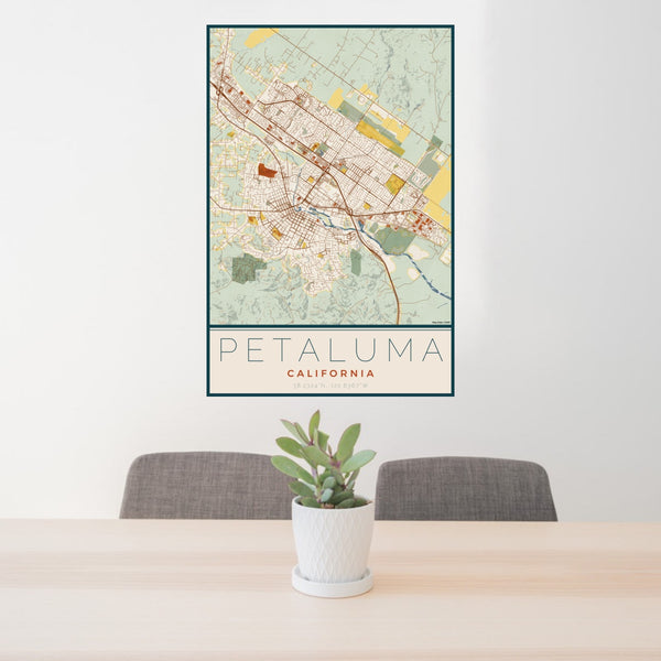 24x36 Petaluma California Map Print Portrait Orientation in Woodblock Style Behind 2 Chairs Table and Potted Plant