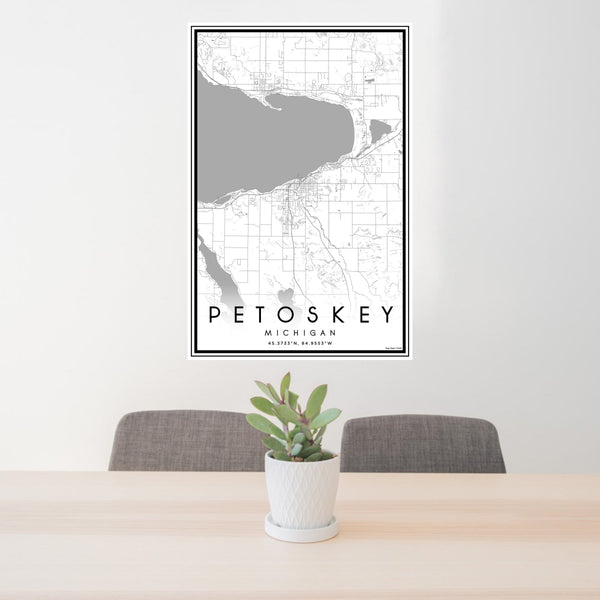 24x36 Petoskey Michigan Map Print Portrait Orientation in Classic Style Behind 2 Chairs Table and Potted Plant