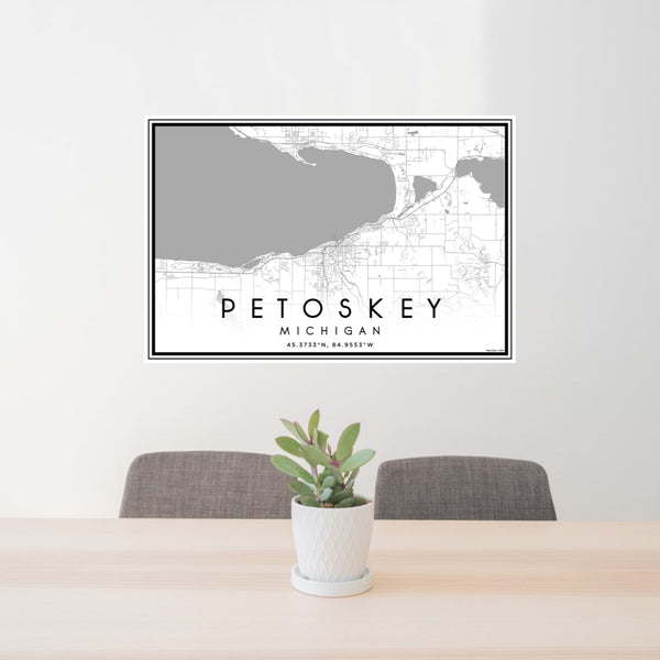 24x36 Petoskey Michigan Map Print Landscape Orientation in Classic Style Behind 2 Chairs Table and Potted Plant
