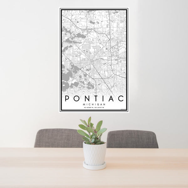 24x36 Pontiac Michigan Map Print Portrait Orientation in Classic Style Behind 2 Chairs Table and Potted Plant