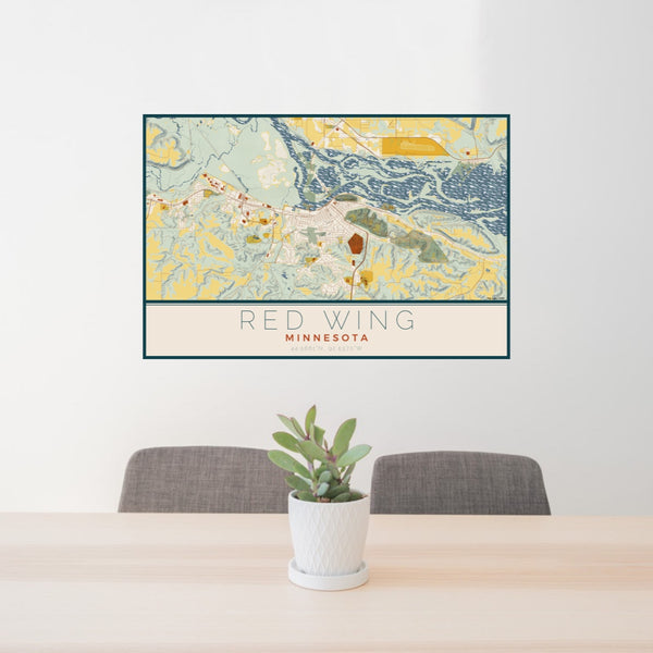 24x36 Red Wing Minnesota Map Print Lanscape Orientation in Woodblock Style Behind 2 Chairs Table and Potted Plant