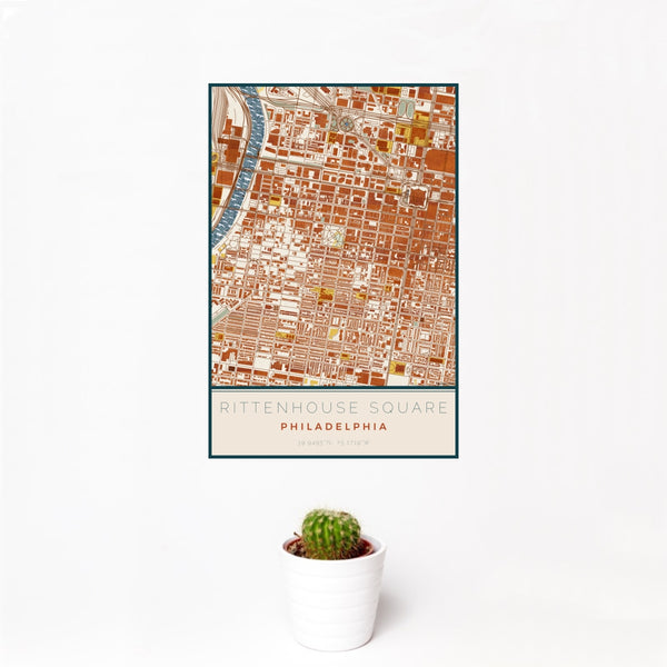 12x18 Rittenhouse Square Philadelphia Map Print Portrait Orientation in Woodblock Style With Small Cactus Plant in White Planter