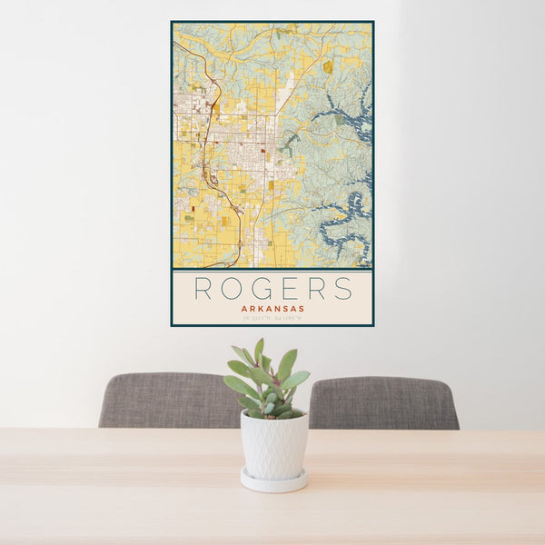 24x36 Rogers Arkansas Map Print Portrait Orientation in Woodblock Style Behind 2 Chairs Table and Potted Plant