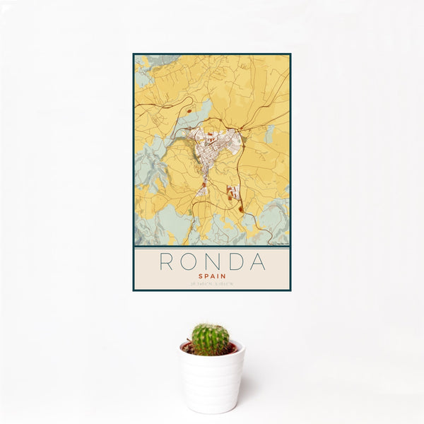 12x18 Ronda Spain Map Print Portrait Orientation in Woodblock Style With Small Cactus Plant in White Planter
