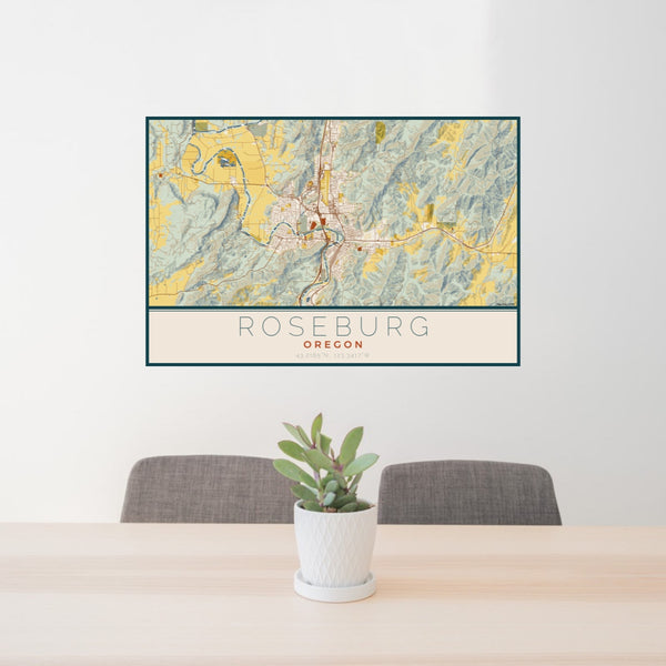 24x36 Roseburg Oregon Map Print Lanscape Orientation in Woodblock Style Behind 2 Chairs Table and Potted Plant