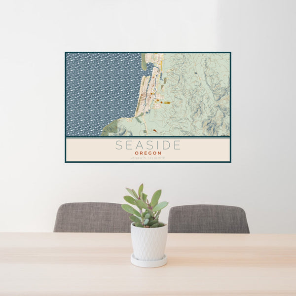 24x36 Seaside Oregon Map Print Lanscape Orientation in Woodblock Style Behind 2 Chairs Table and Potted Plant