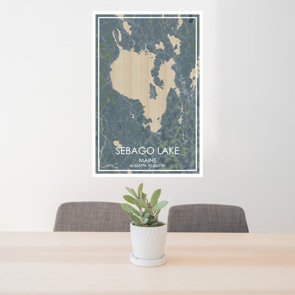 24x36 Sebago Lake Maine Map Print Portrait Orientation in Afternoon Style Behind 2 Chairs Table and Potted Plant