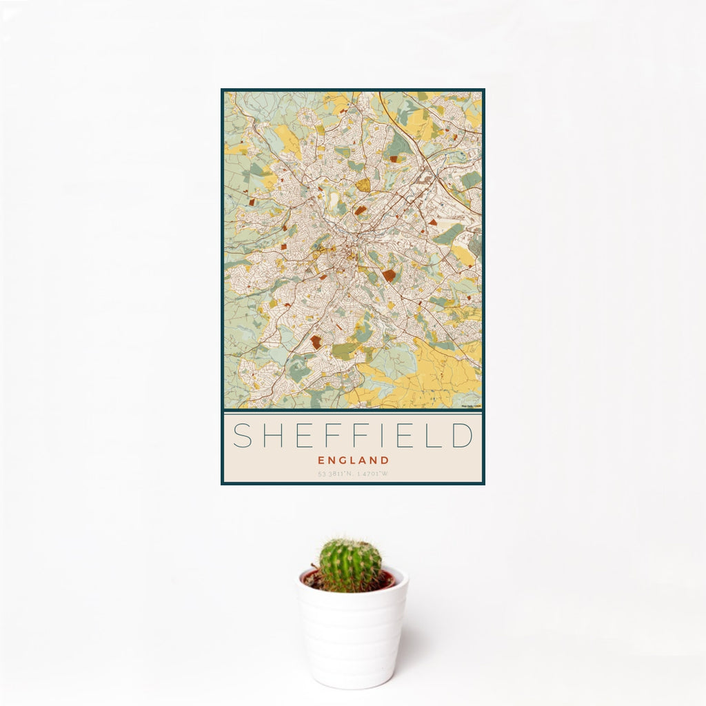 12x18 Sheffield England Map Print Portrait Orientation in Woodblock Style With Small Cactus Plant in White Planter