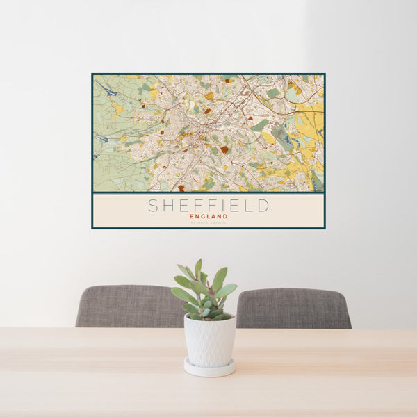 24x36 Sheffield England Map Print Landscape Orientation in Woodblock Style Behind 2 Chairs Table and Potted Plant