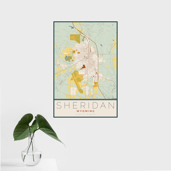 16x24 Sheridan Wyoming Map Print Portrait Orientation in Woodblock Style With Tropical Plant Leaves in Water
