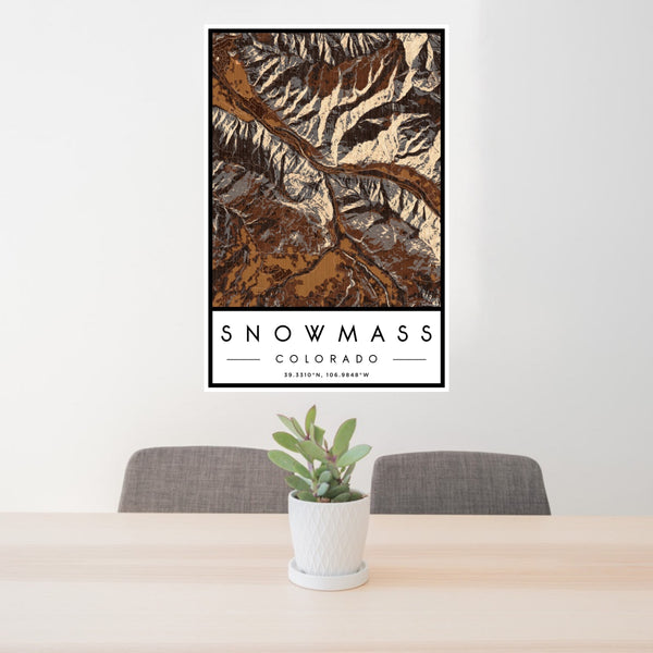 24x36 Snowmass Colorado Map Print Portrait Orientation in Ember Style Behind 2 Chairs Table and Potted Plant