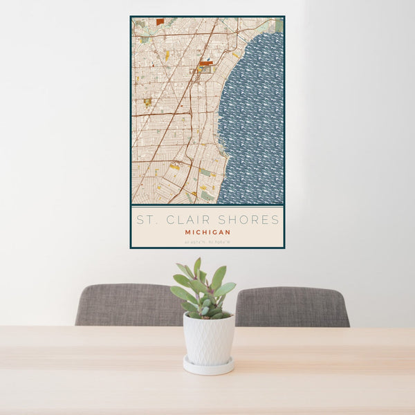 24x36 St. Clair Shores Michigan Map Print Portrait Orientation in Woodblock Style Behind 2 Chairs Table and Potted Plant