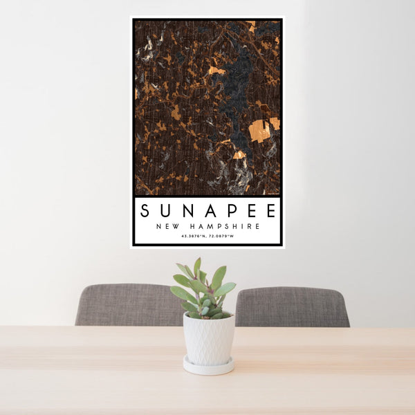24x36 Sunapee New Hampshire Map Print Portrait Orientation in Ember Style Behind 2 Chairs Table and Potted Plant