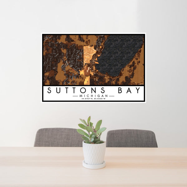 24x36 Suttons Bay Michigan Map Print Lanscape Orientation in Ember Style Behind 2 Chairs Table and Potted Plant