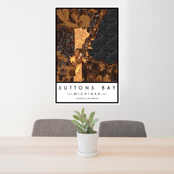 24x36 Suttons Bay Michigan Map Print Portrait Orientation in Ember Style Behind 2 Chairs Table and Potted Plant