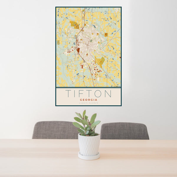 24x36 Tifton Georgia Map Print Portrait Orientation in Woodblock Style Behind 2 Chairs Table and Potted Plant