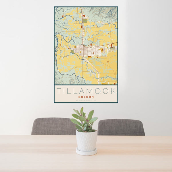 24x36 Tillamook Oregon Map Print Portrait Orientation in Woodblock Style Behind 2 Chairs Table and Potted Plant