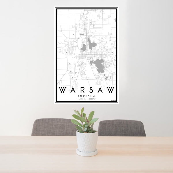 24x36 Warsaw Indiana Map Print Portrait Orientation in Classic Style Behind 2 Chairs Table and Potted Plant